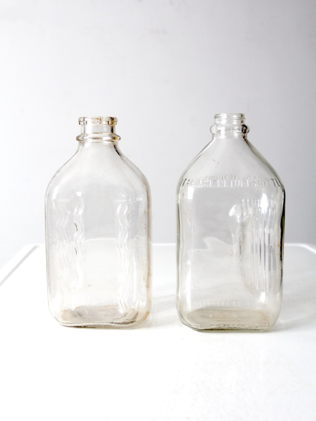 vintage glass milk jugs pair