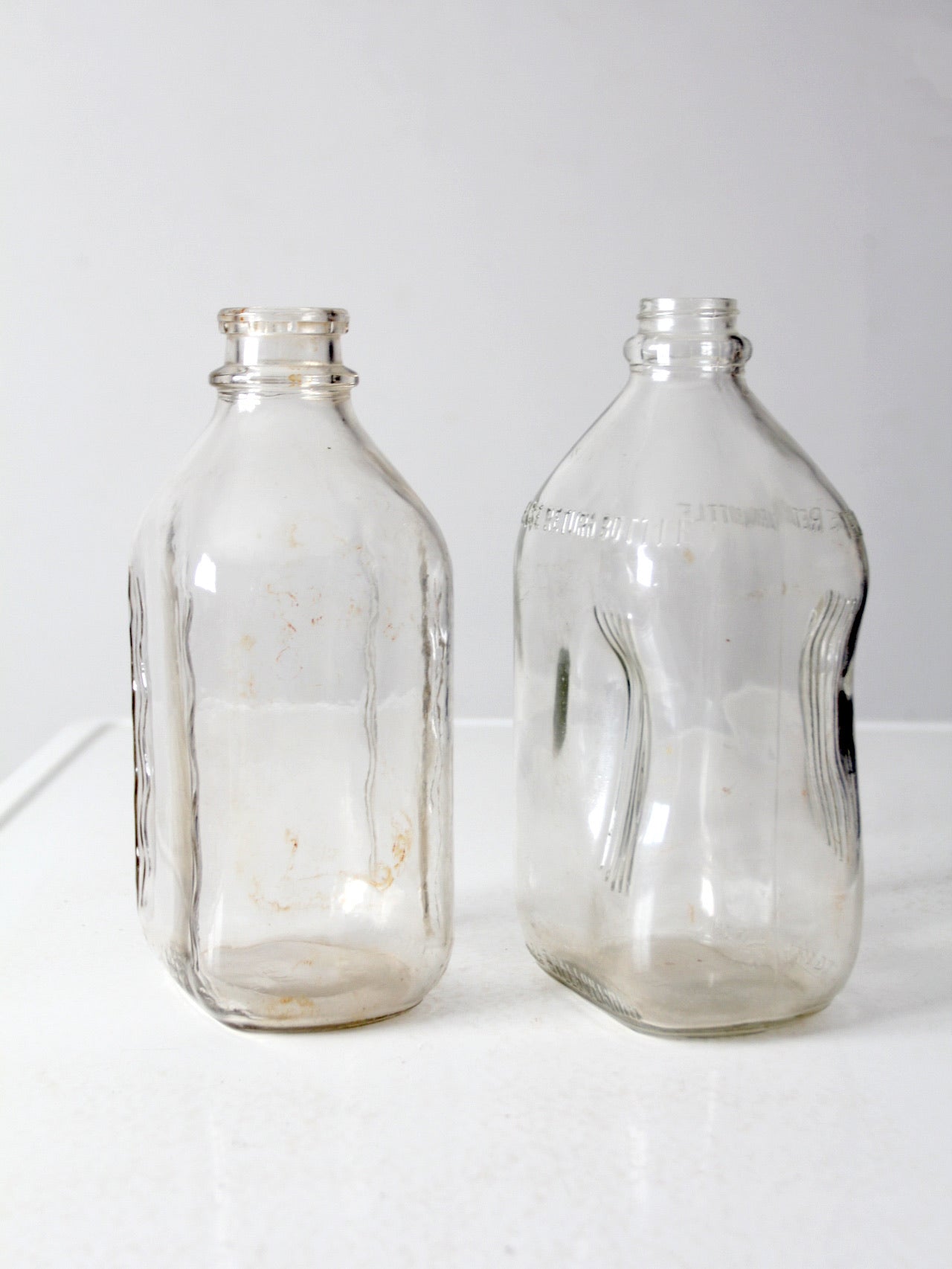 vintage glass milk jugs pair