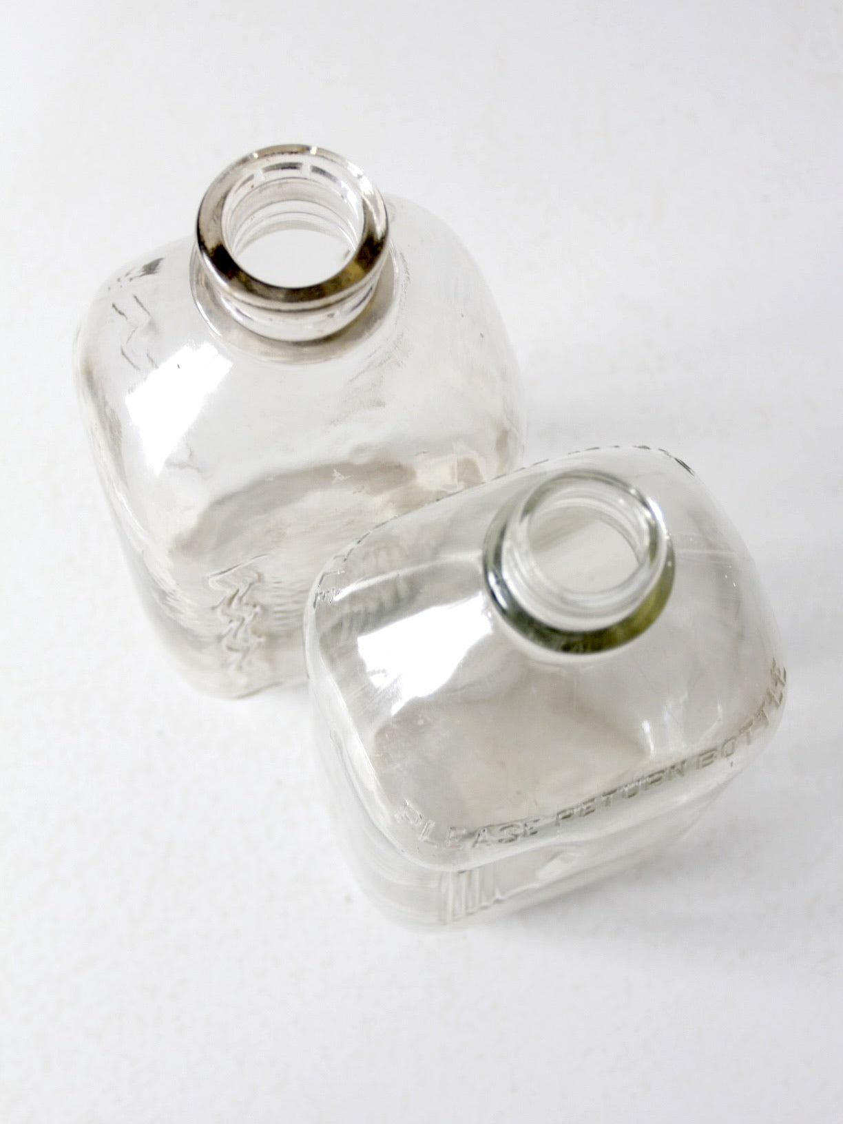 vintage glass milk jugs pair