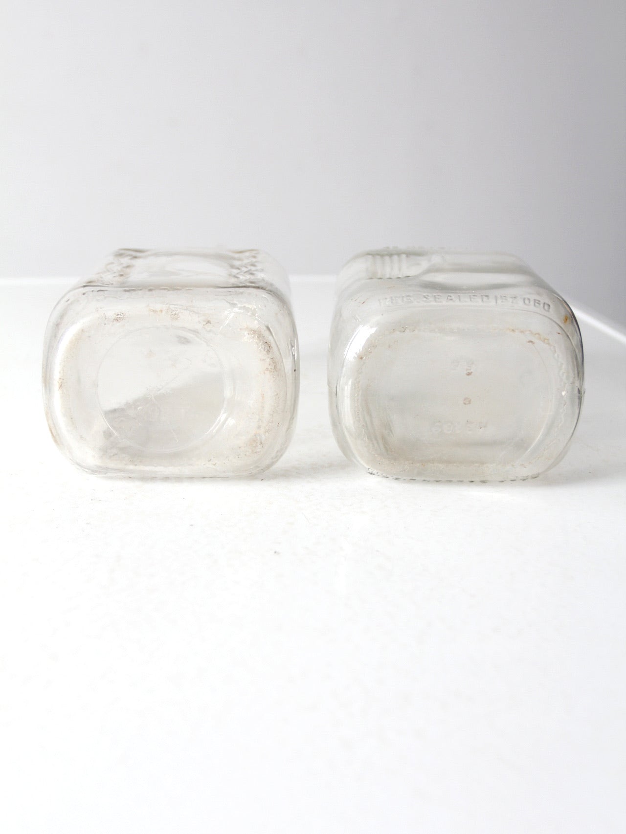 vintage glass milk jugs pair