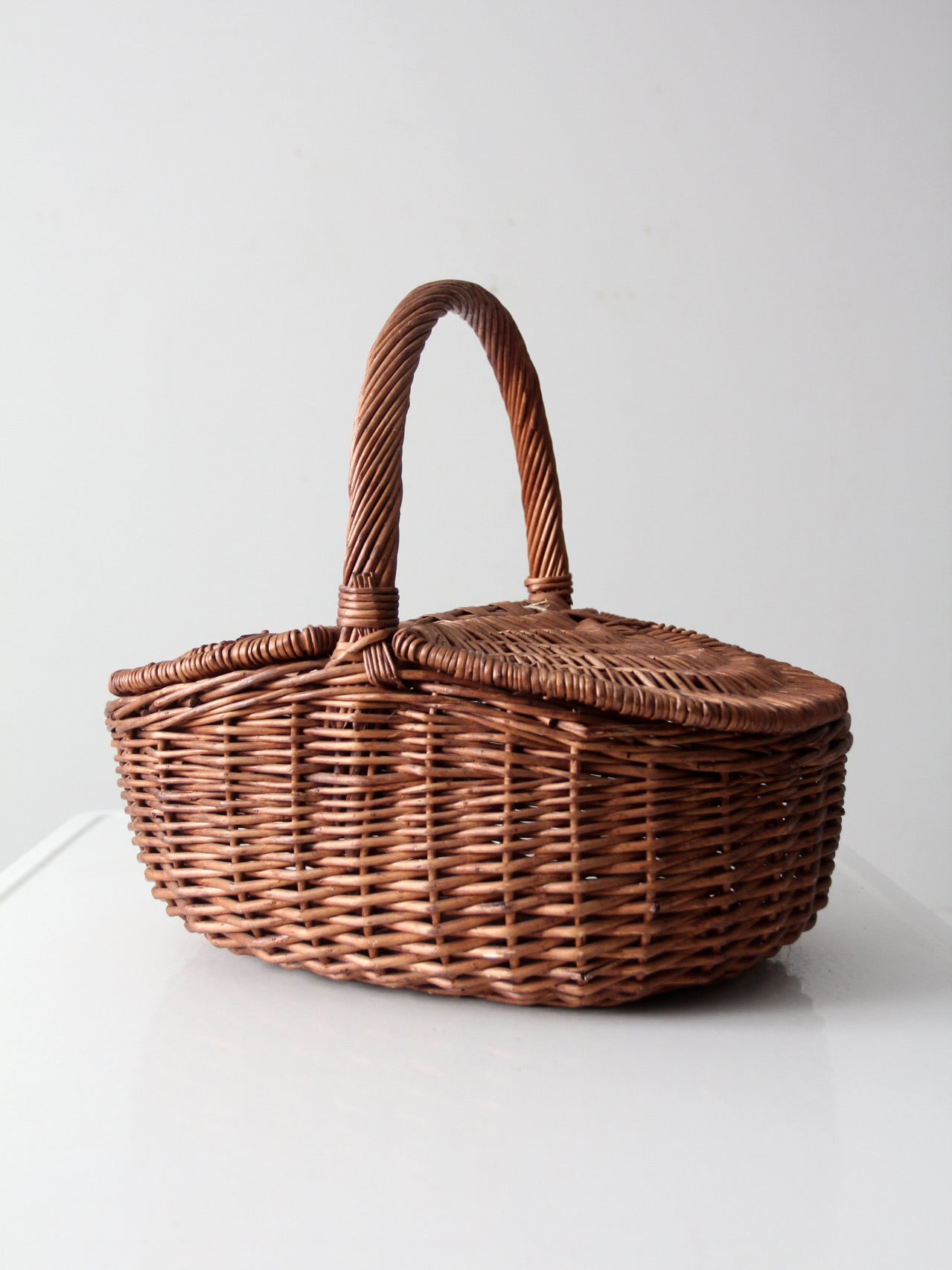 vintage wicker split-lid picnic basket