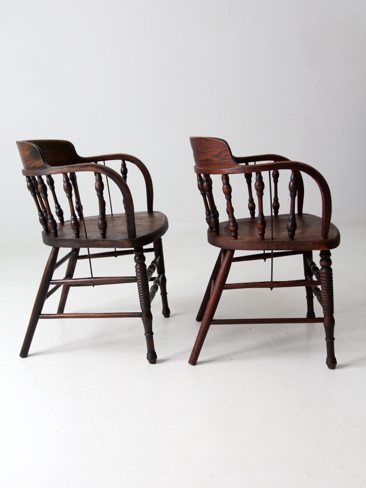 antique captains chair pair