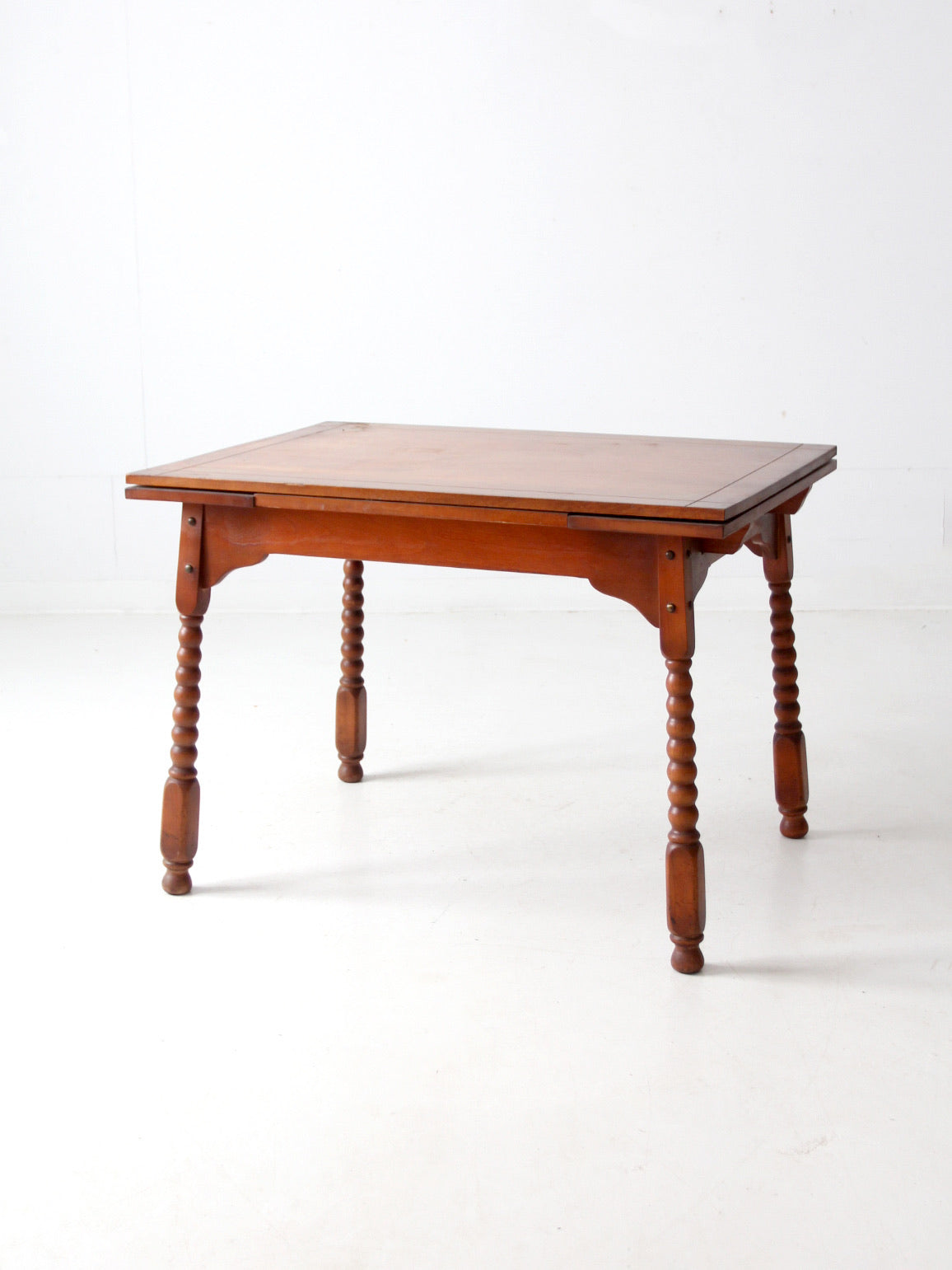 vintage 1940s kitchen table with slide out extensions