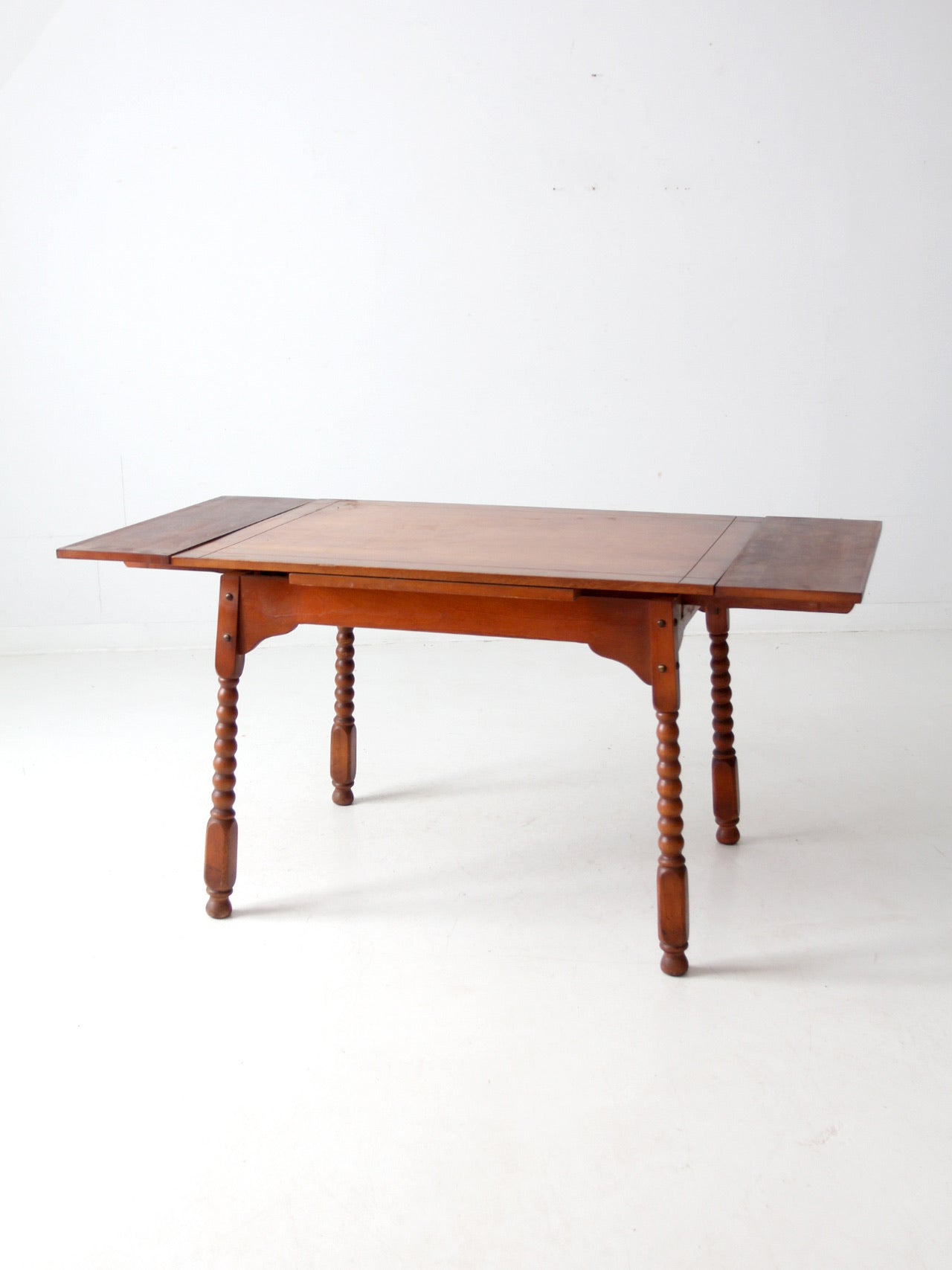 vintage 1940s kitchen table with slide out extensions