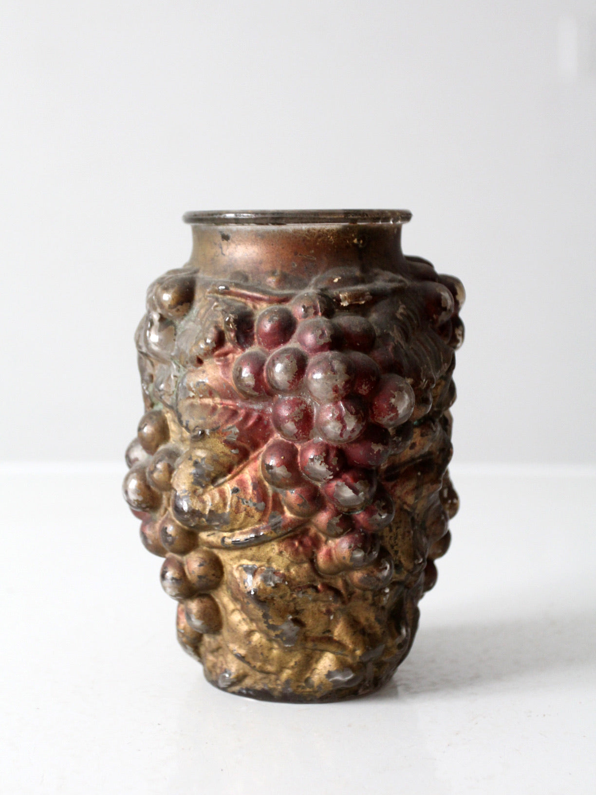 vintage Goofus glass vase with grape relief