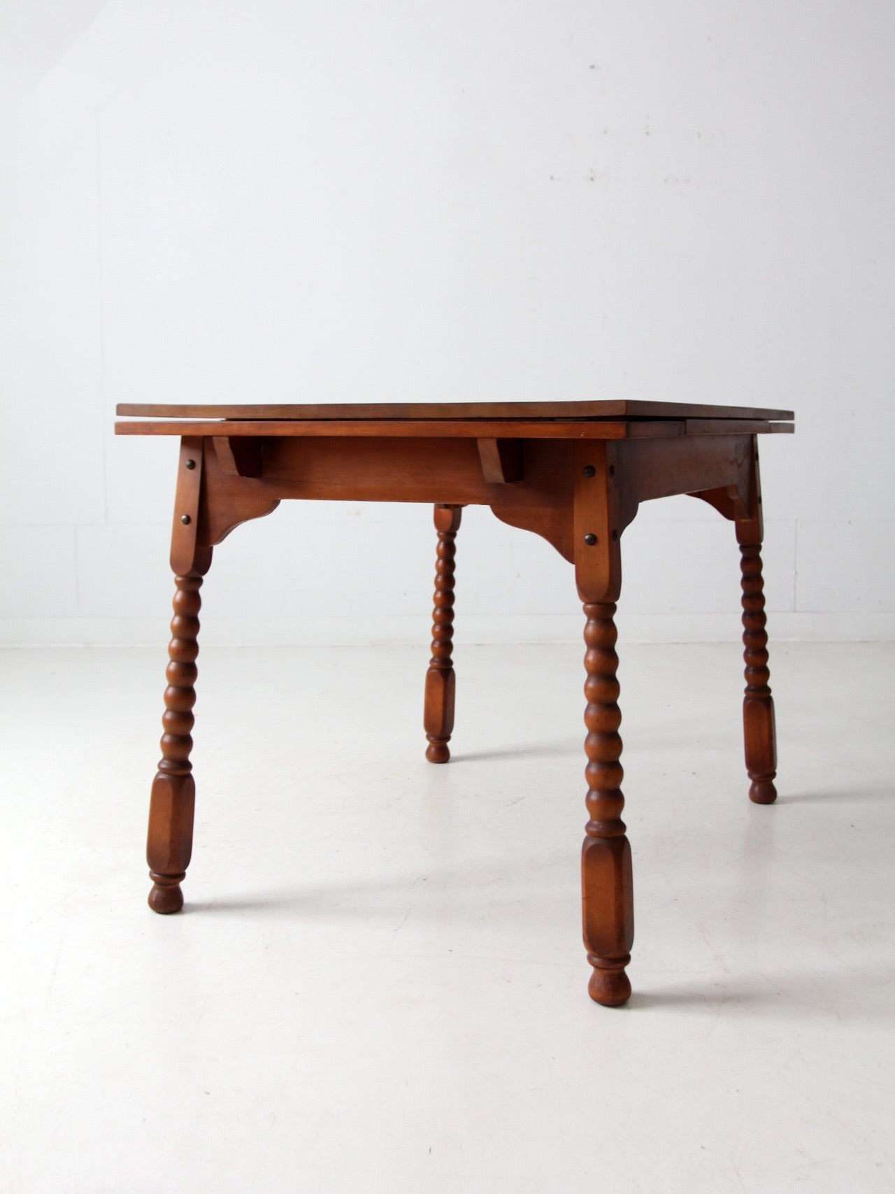 vintage 1940s kitchen table with slide out extensions