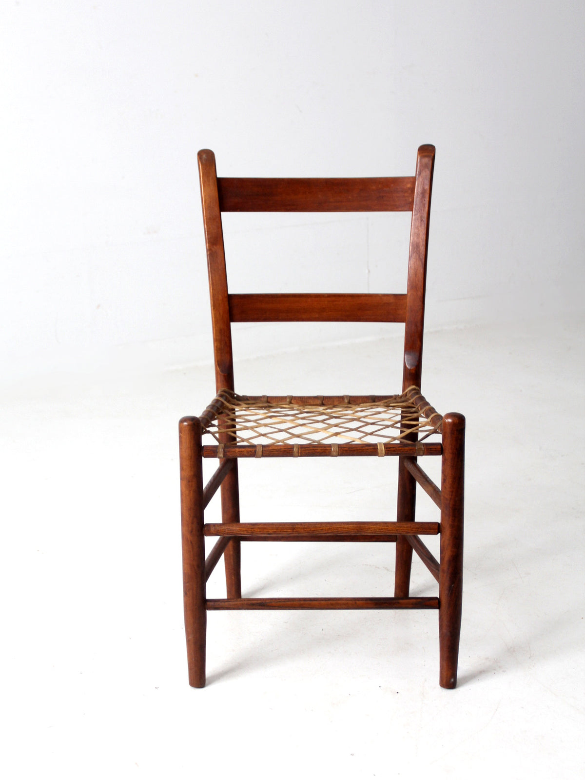 antique rawhide primitive chair