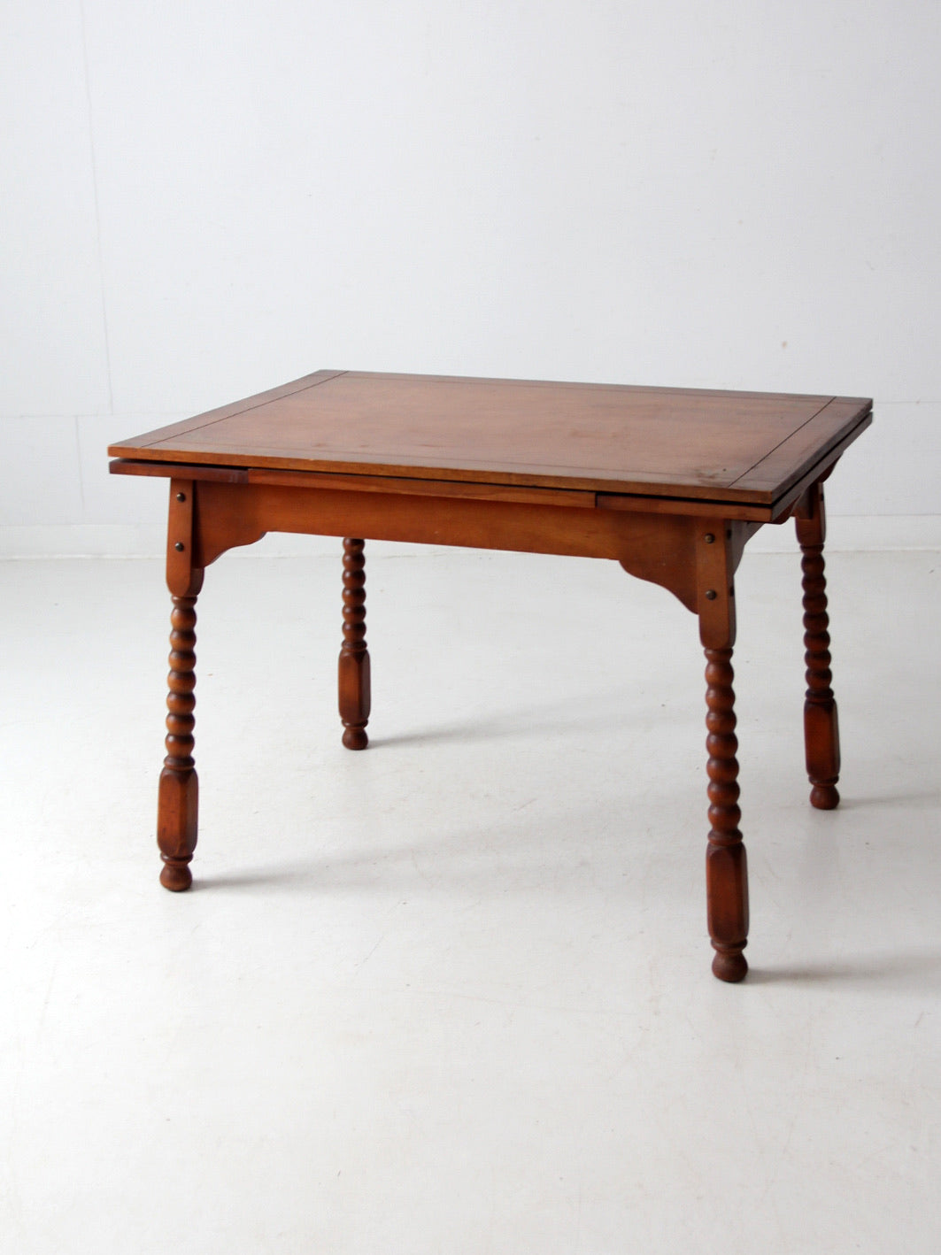 vintage 1940s kitchen table with slide out extensions