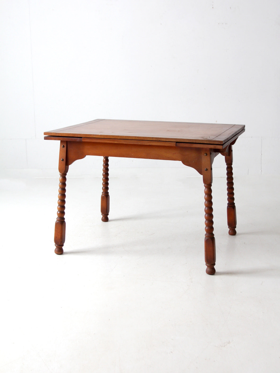 vintage 1940s kitchen table with slide out extensions