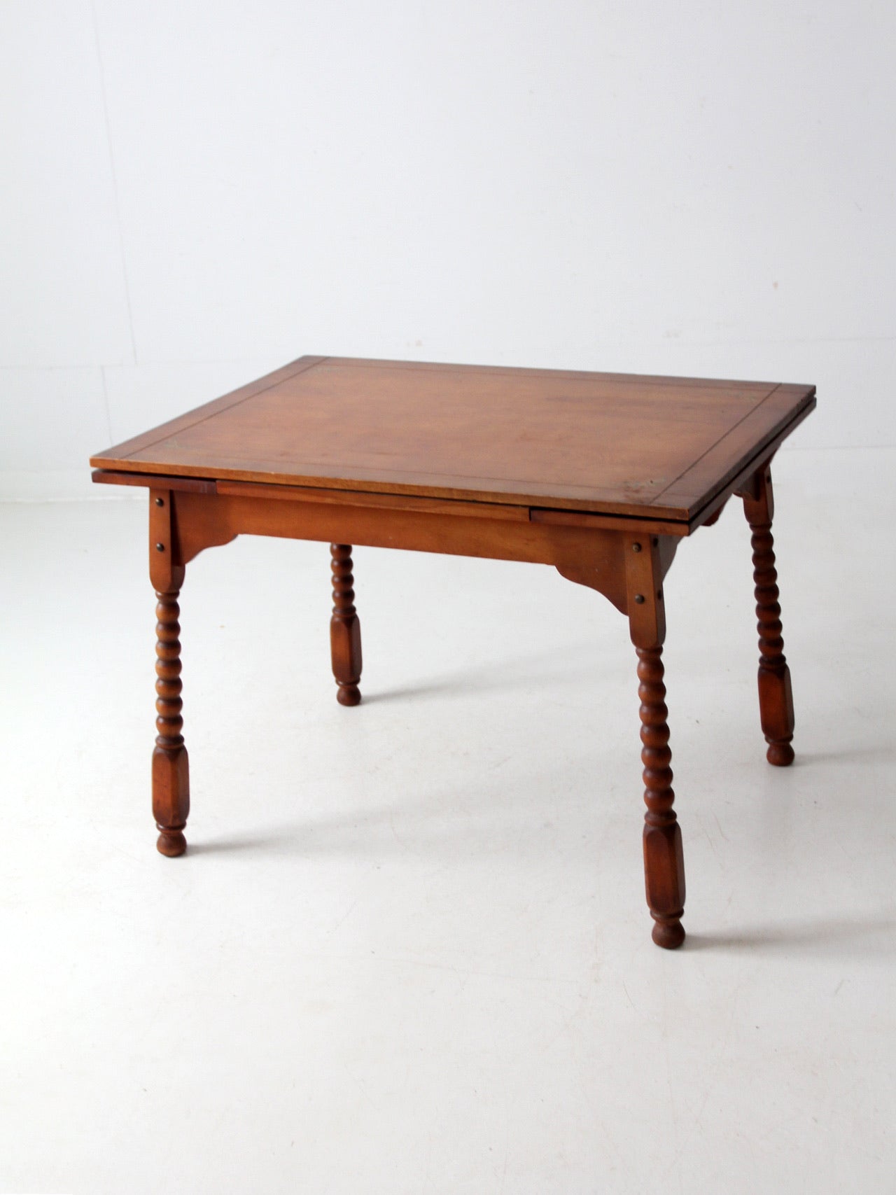 vintage 1940s kitchen table with slide out extensions