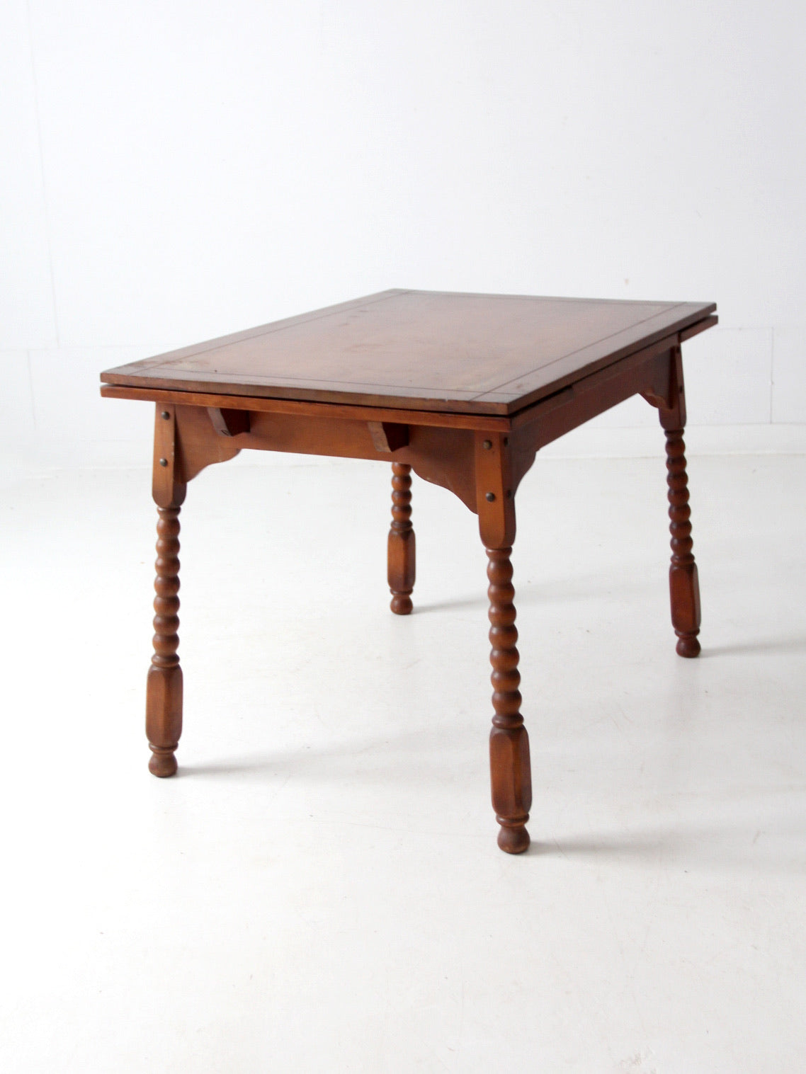 vintage 1940s kitchen table with slide out extensions