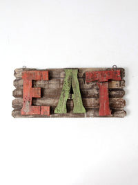 vintage rustic wood "EAT" sign
