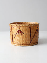vintage woven basket with bamboo motif
