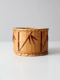 vintage woven basket with bamboo motif