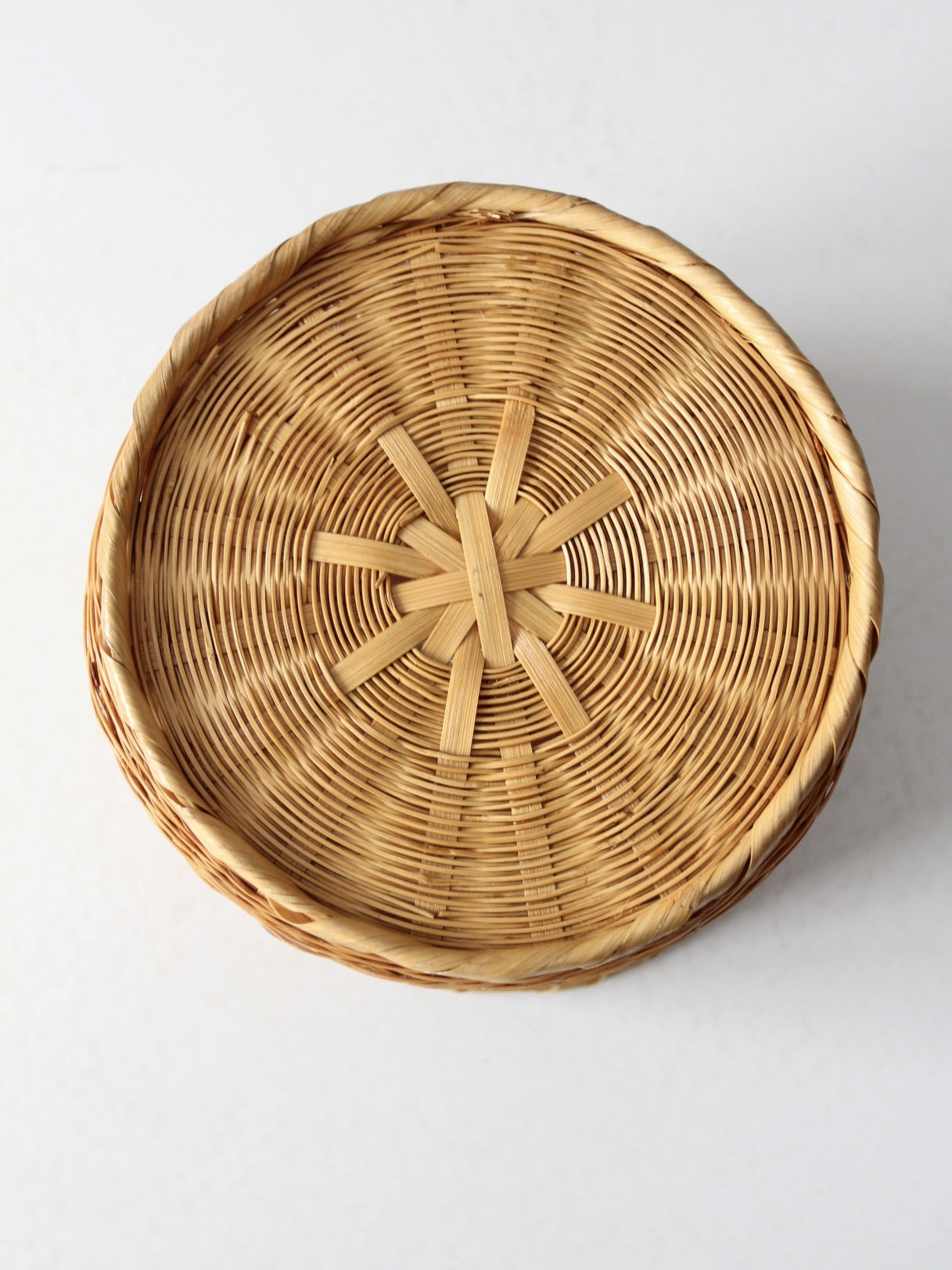 vintage woven basket with bamboo motif