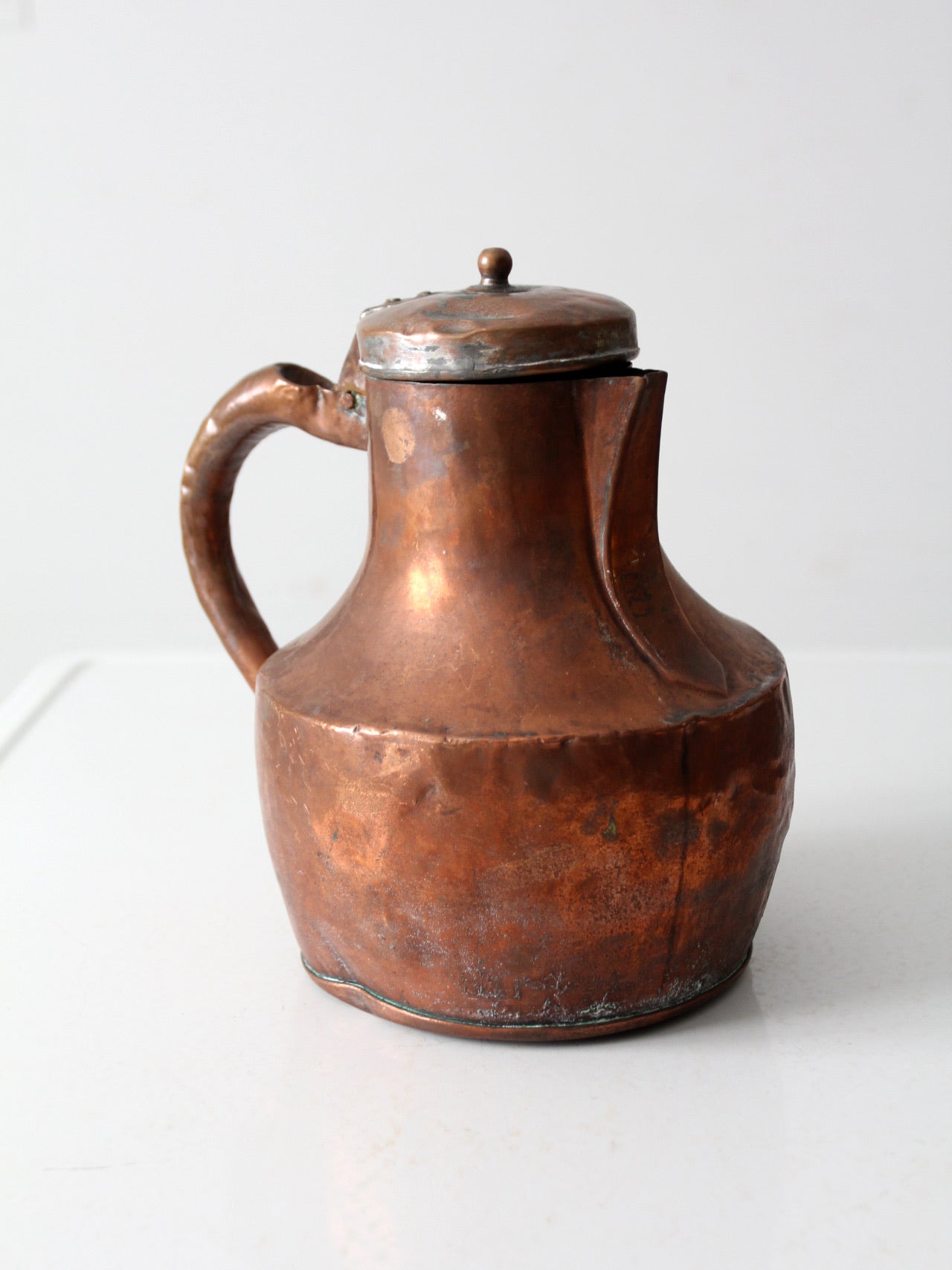 antique copper pitcher
