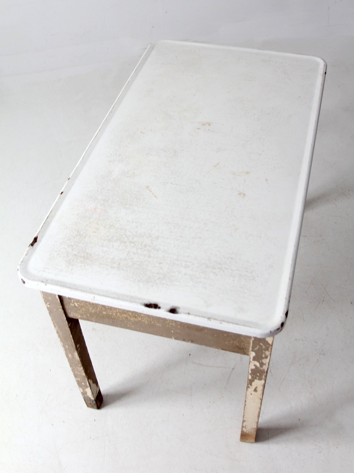 antique enamel top table with ironing board