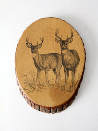 vintage deer wall art on wood slab