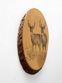 vintage deer wall art on wood slab