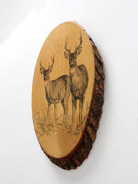 vintage deer wall art on wood slab