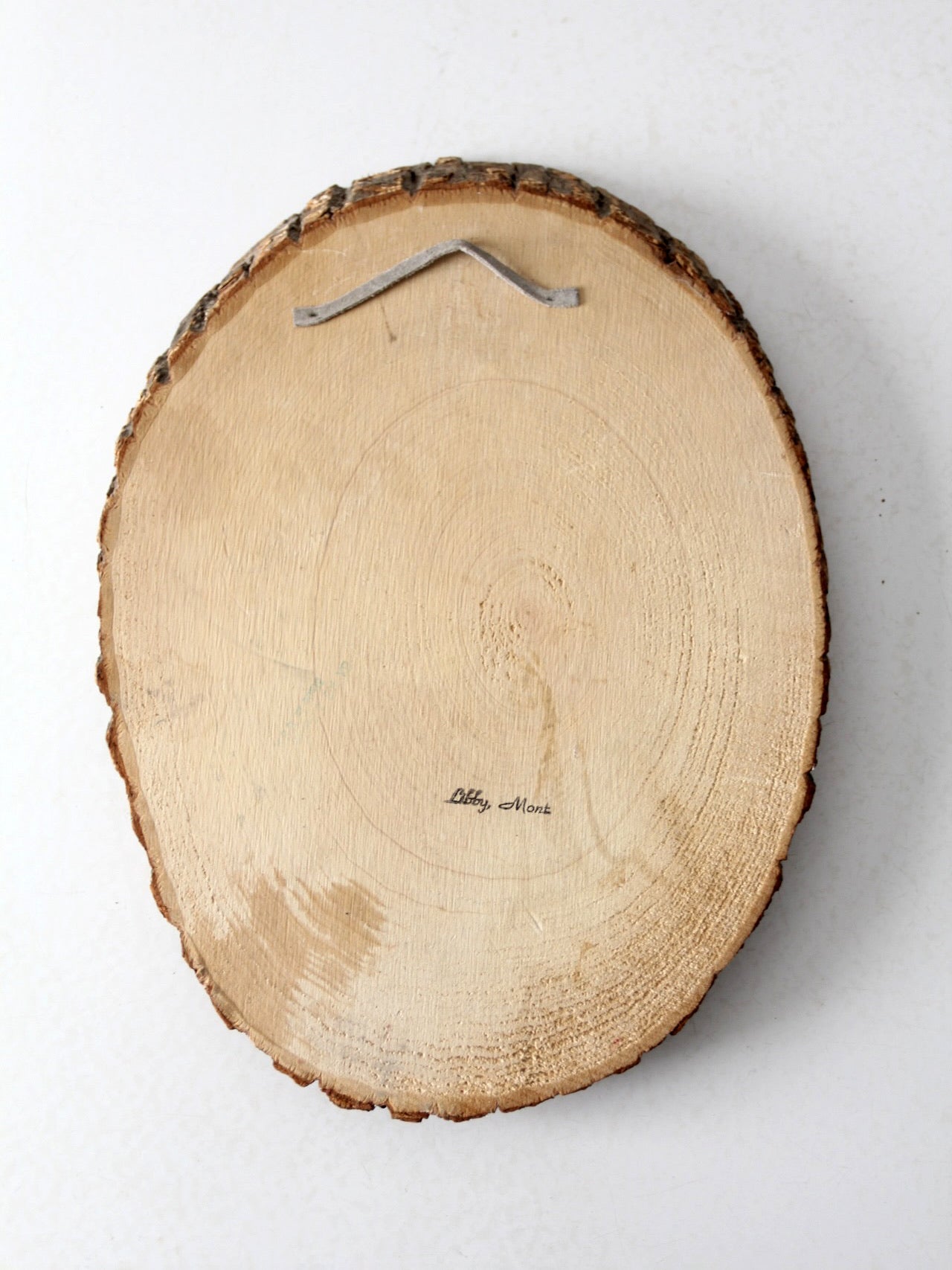 vintage deer wall art on wood slab