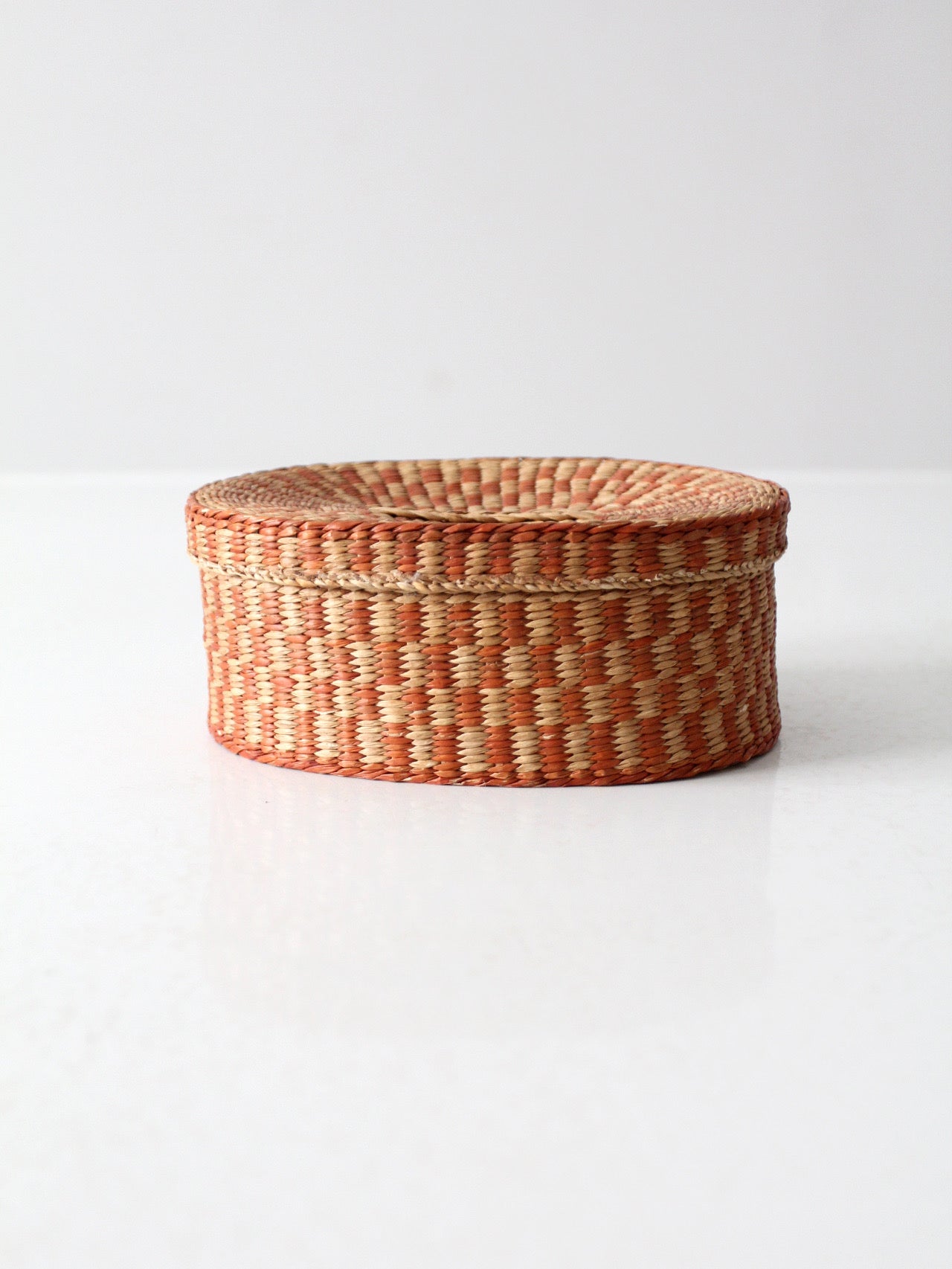 vintage handwoven lidded basket