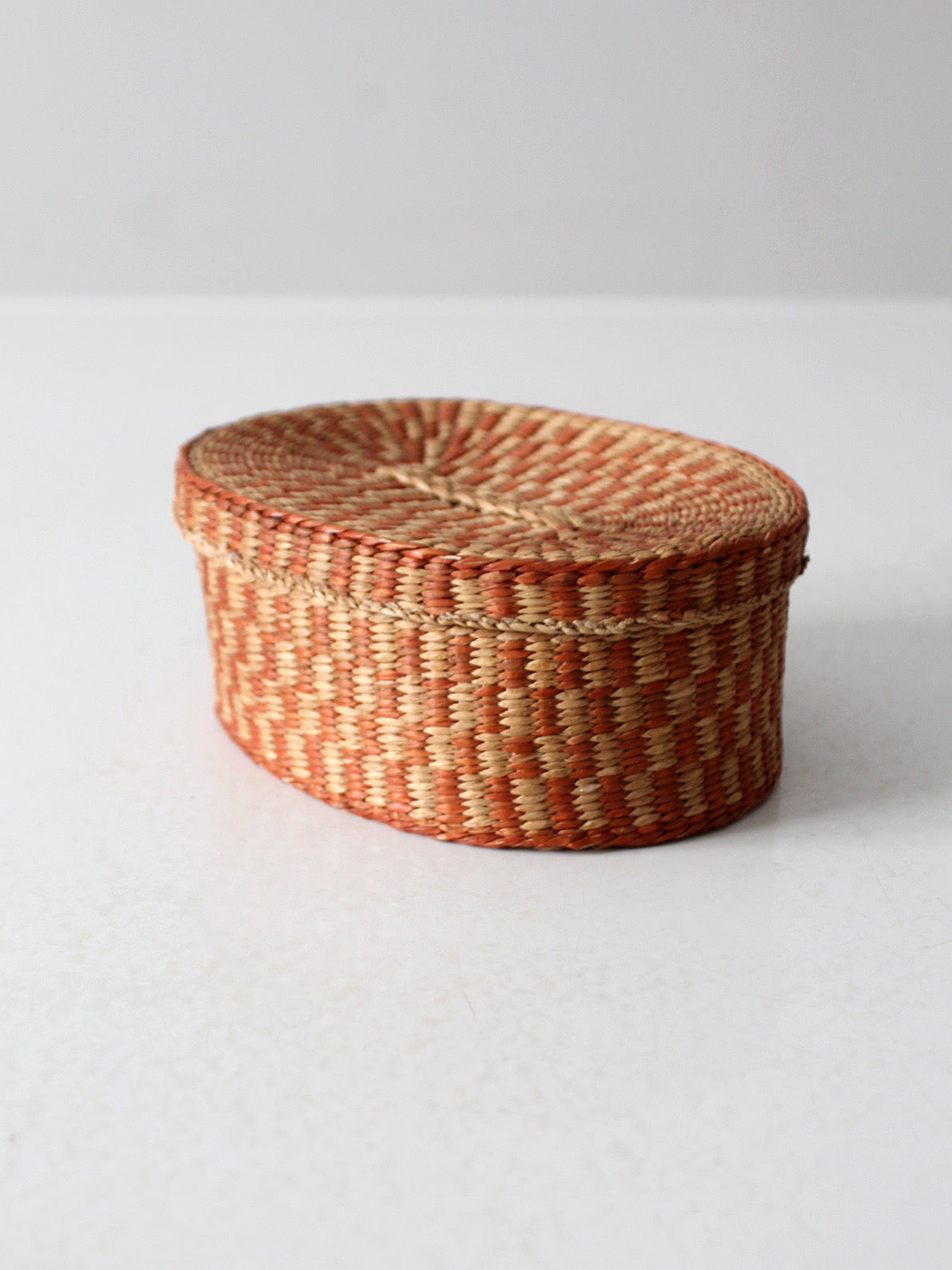 vintage handwoven lidded basket