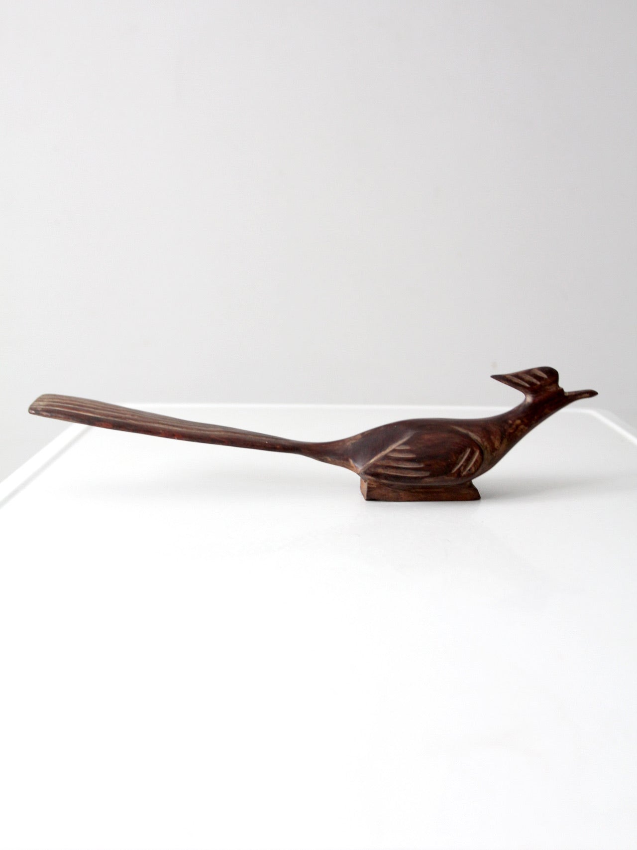 mid-century hand-carved ironwood roadrunner