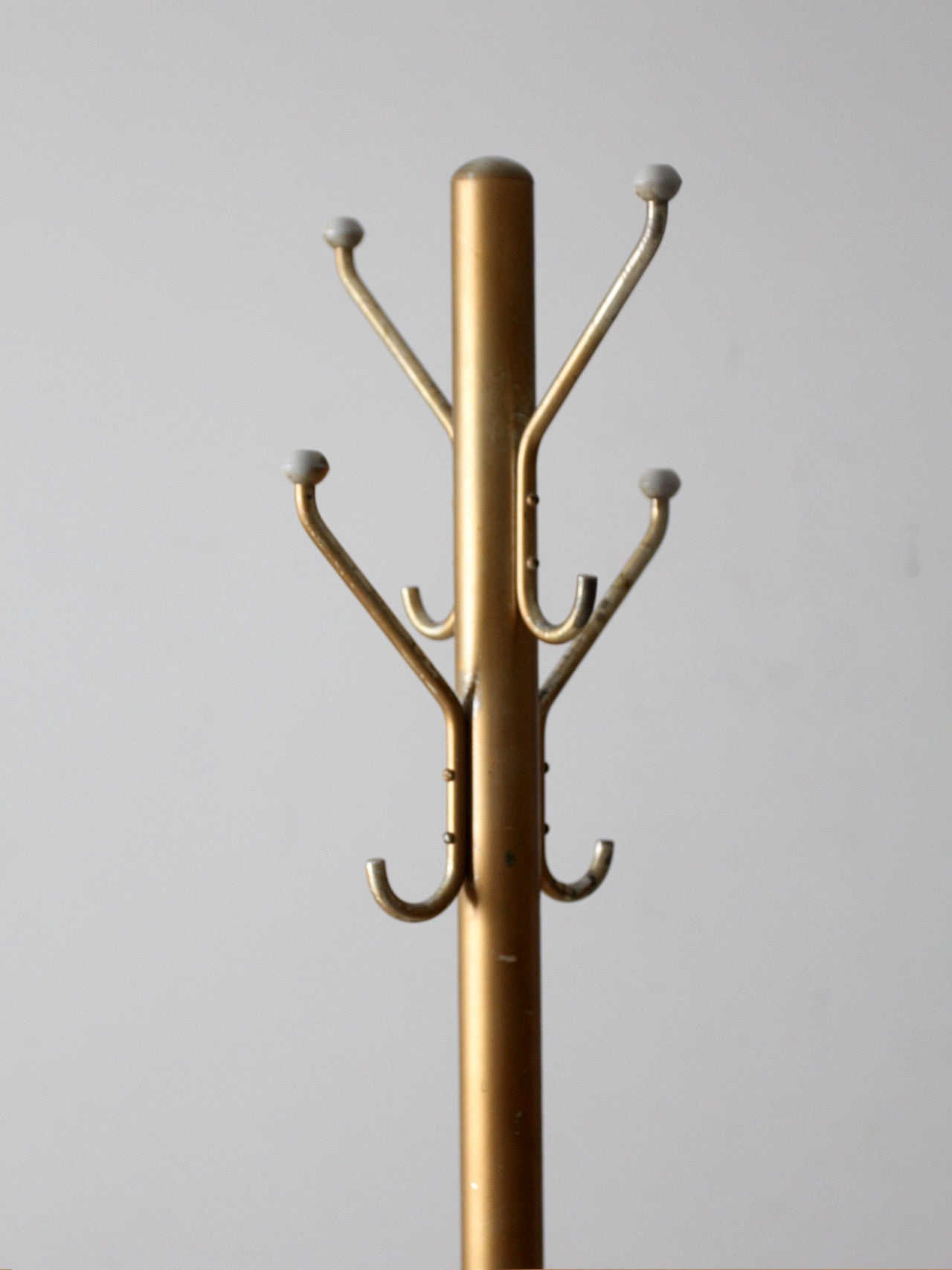 mid-century gold tone aluminum coat rack hall stand