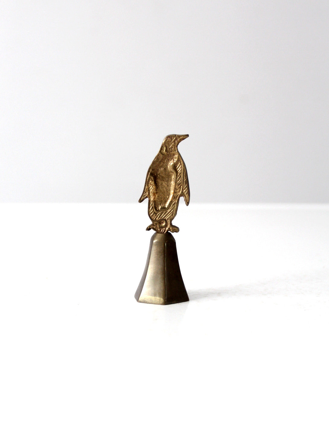 vintage brass penguin
