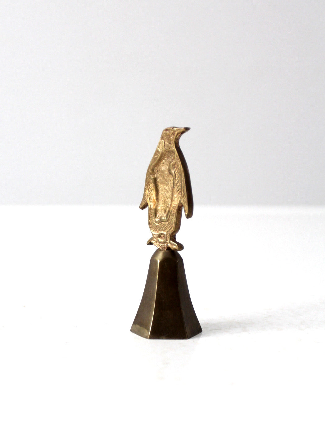 vintage brass penguin