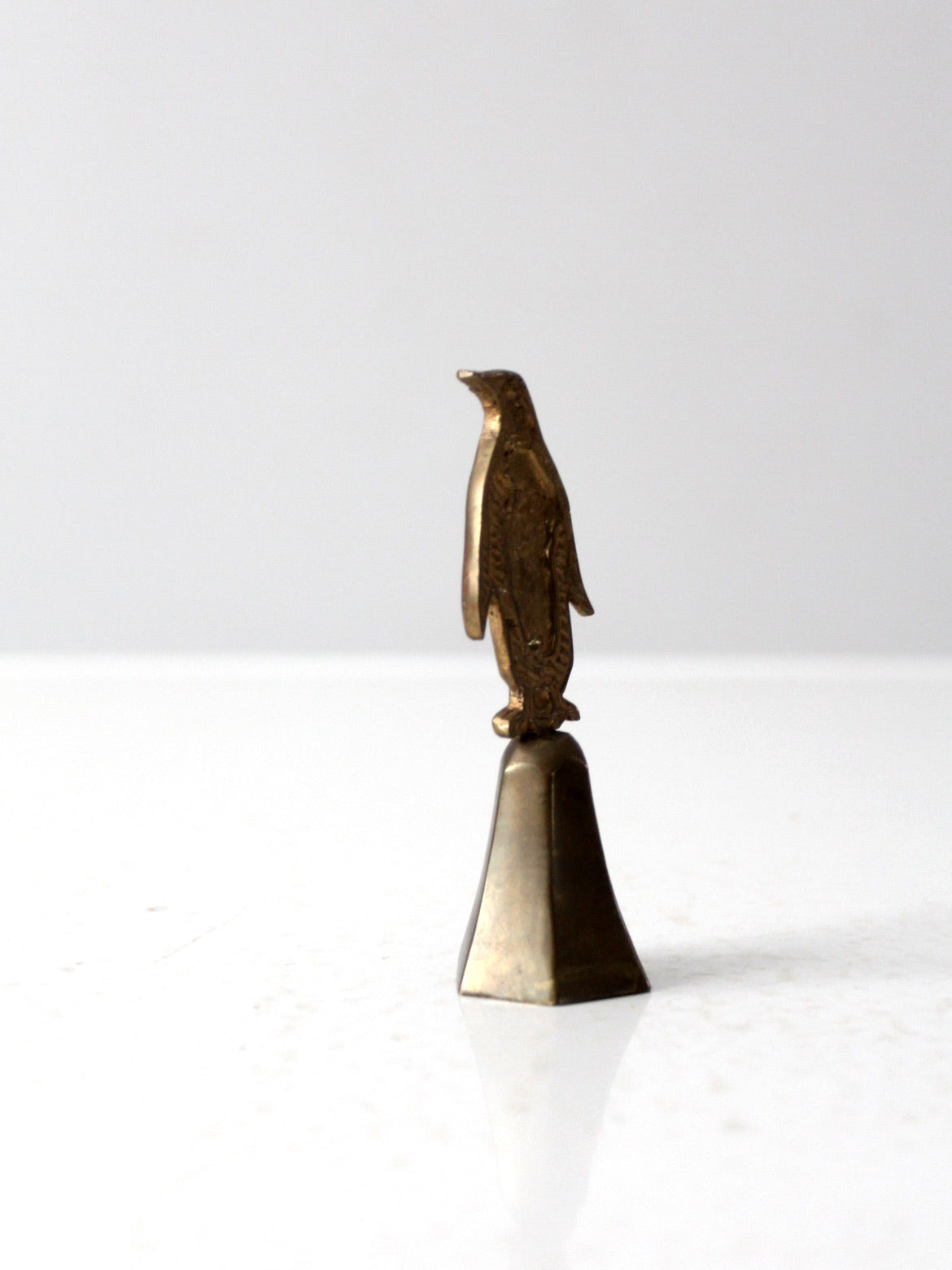 vintage brass penguin