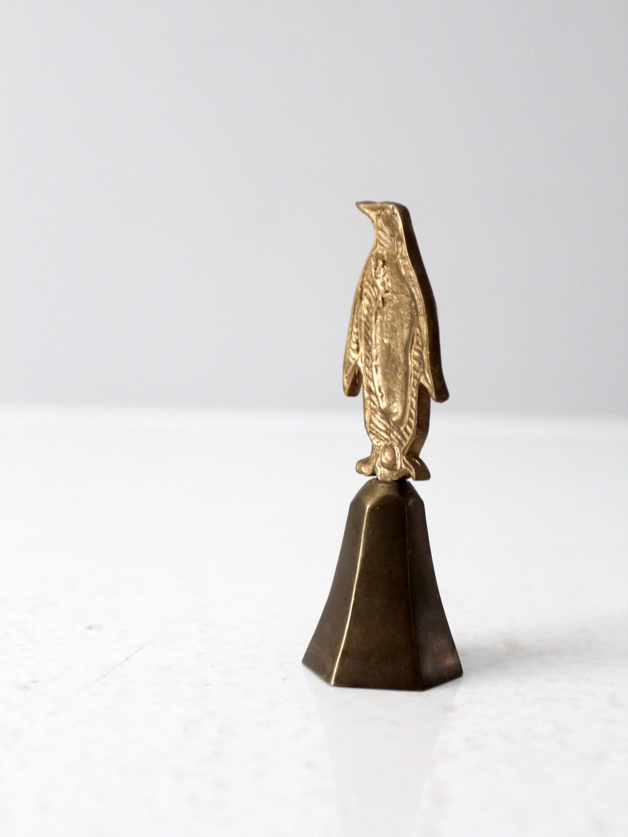 vintage brass penguin