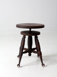 antique claw and ball foot piano stool