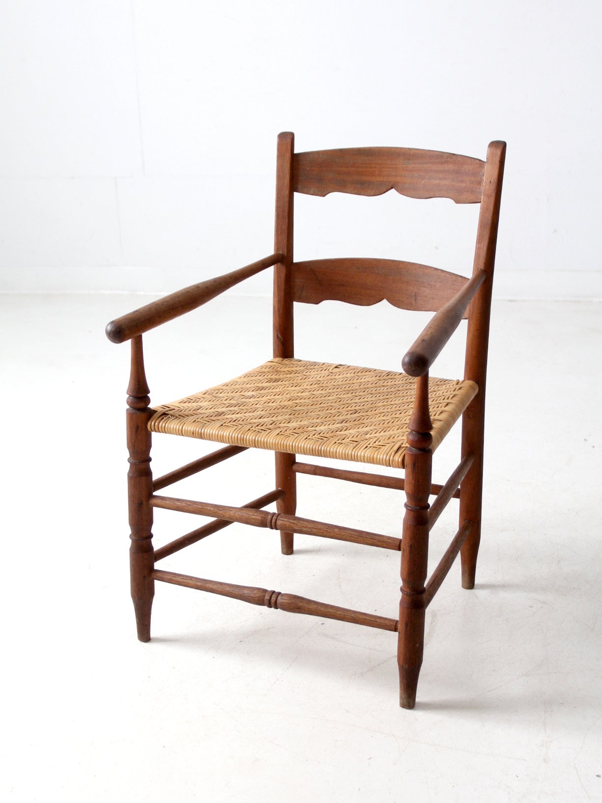 antique woven seat armchair