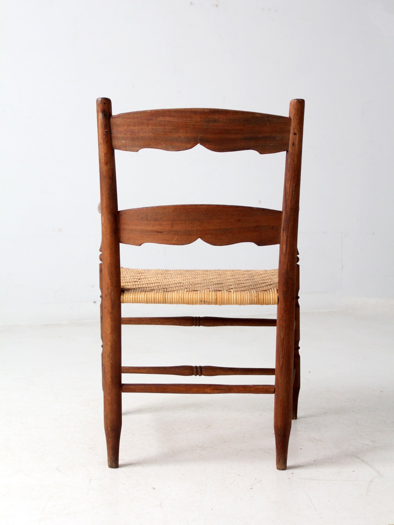 antique woven seat armchair