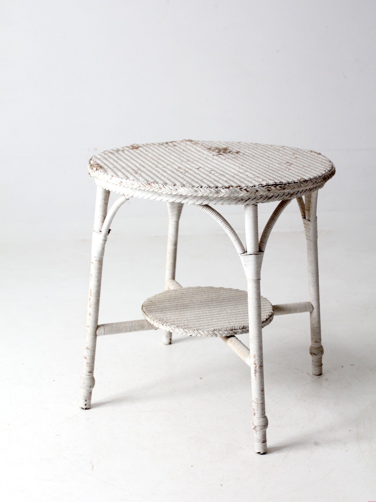 antique white wicker accent table