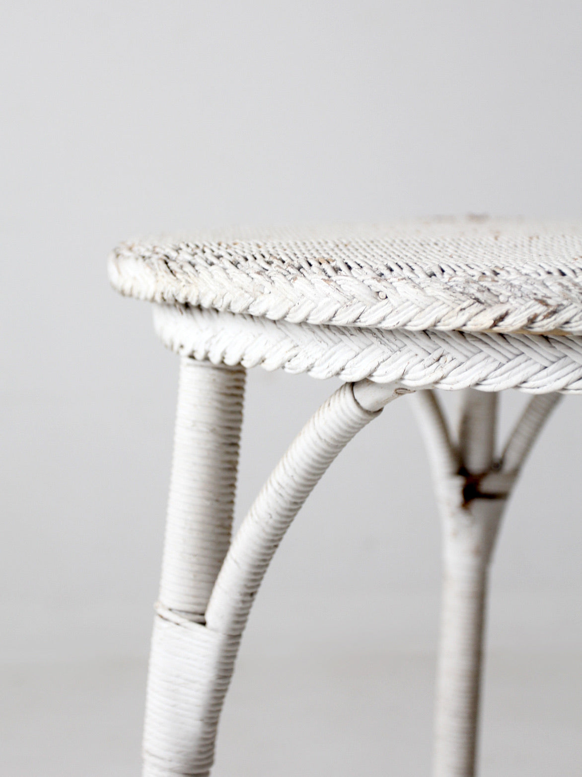 antique white wicker accent table