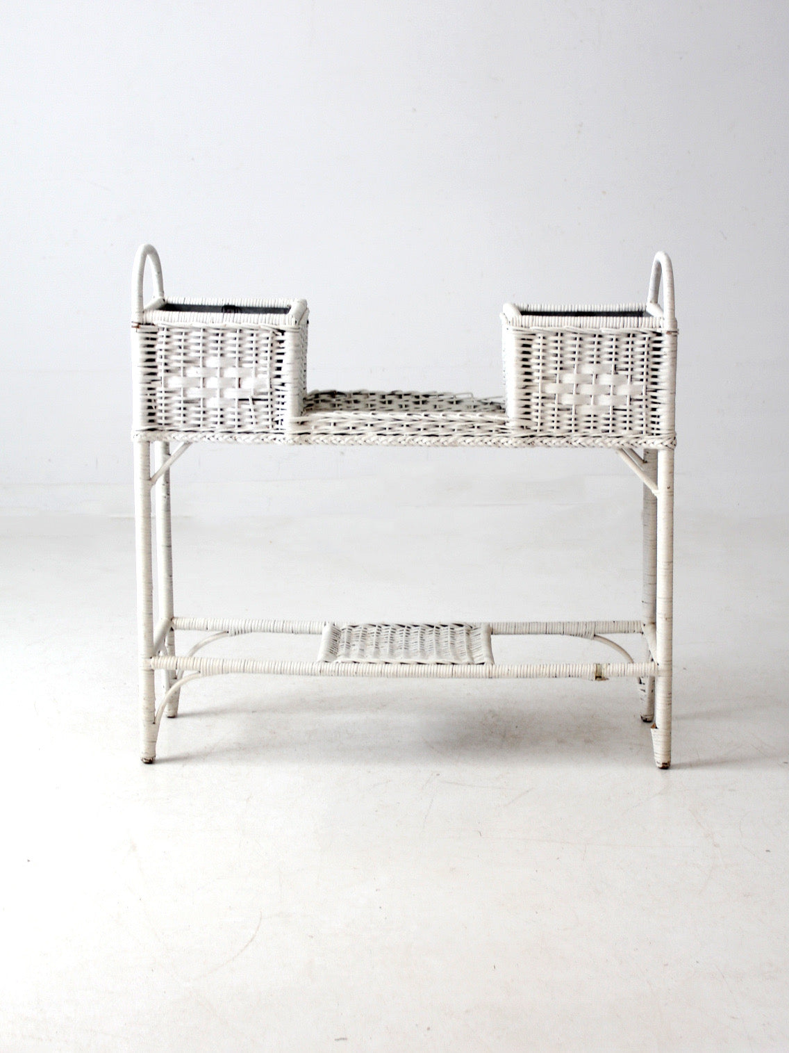 antique white wicker planter basket stand
