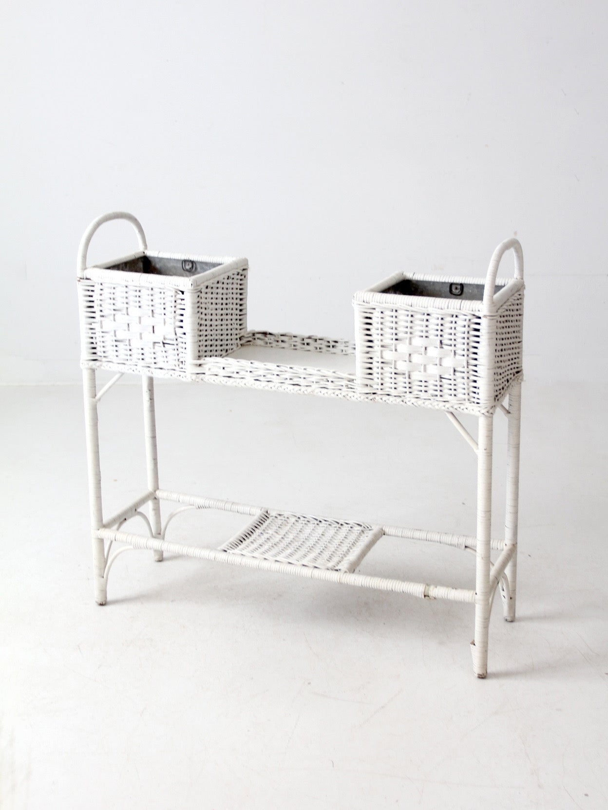 antique white wicker planter basket stand