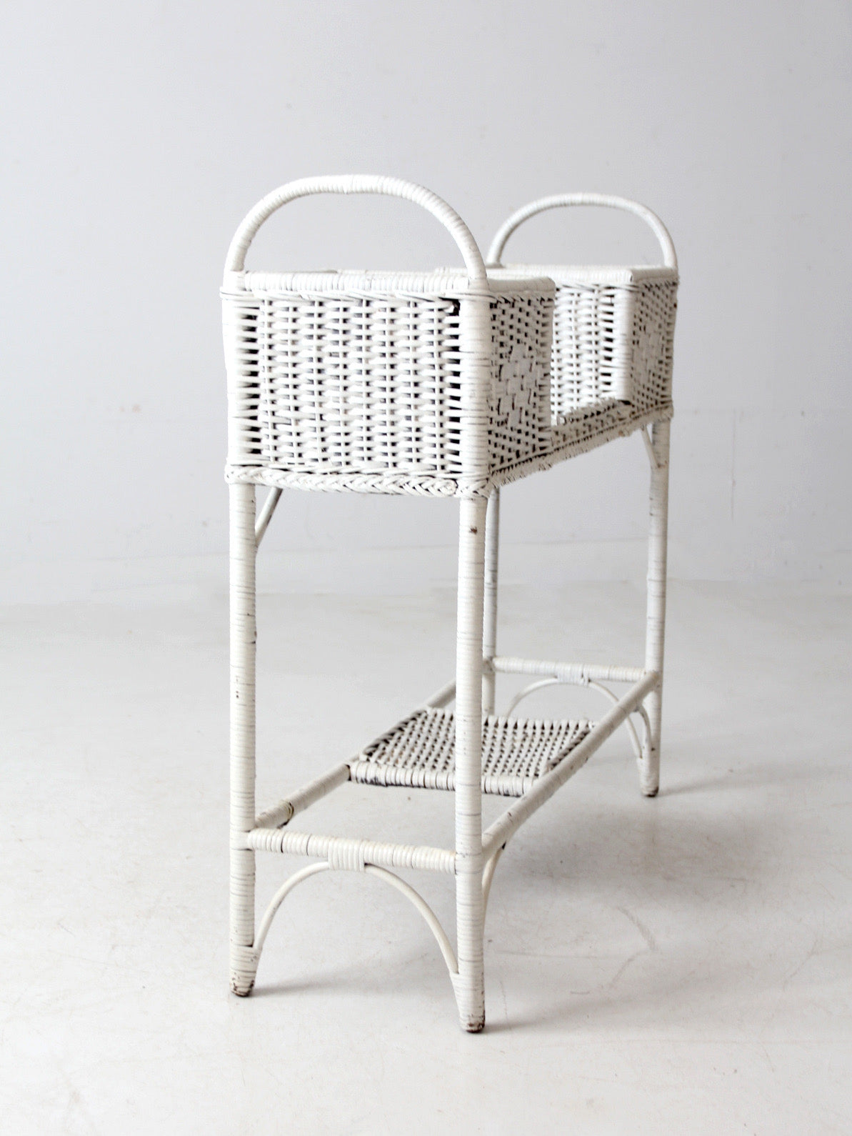 antique white wicker planter basket stand