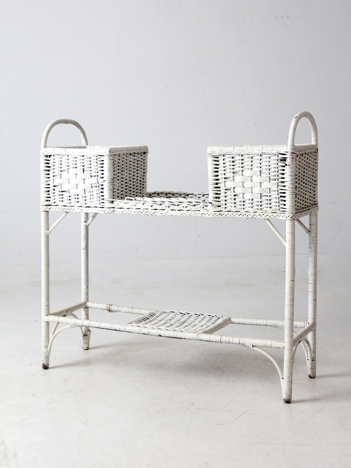antique white wicker planter basket stand