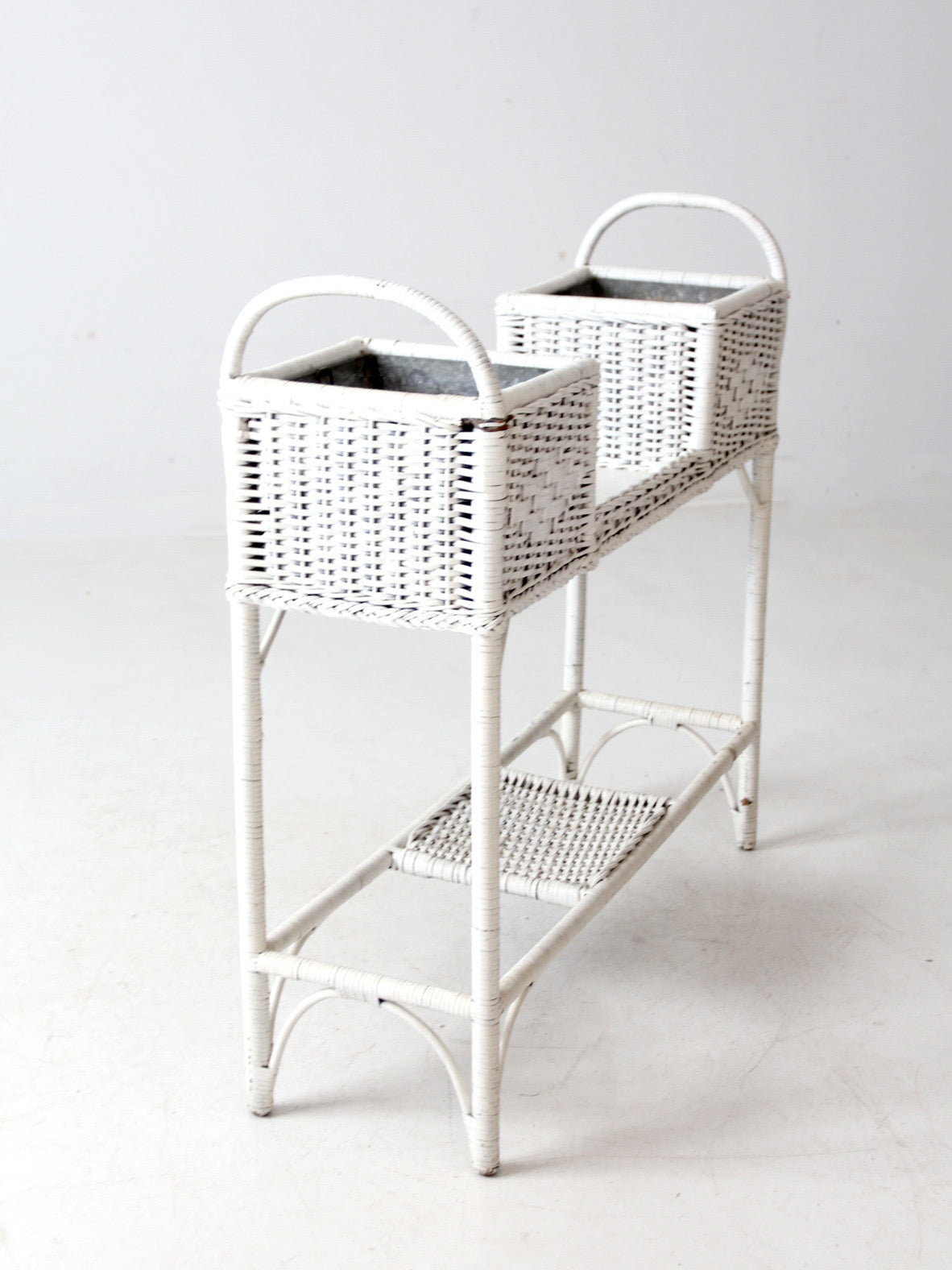 antique white wicker planter basket stand