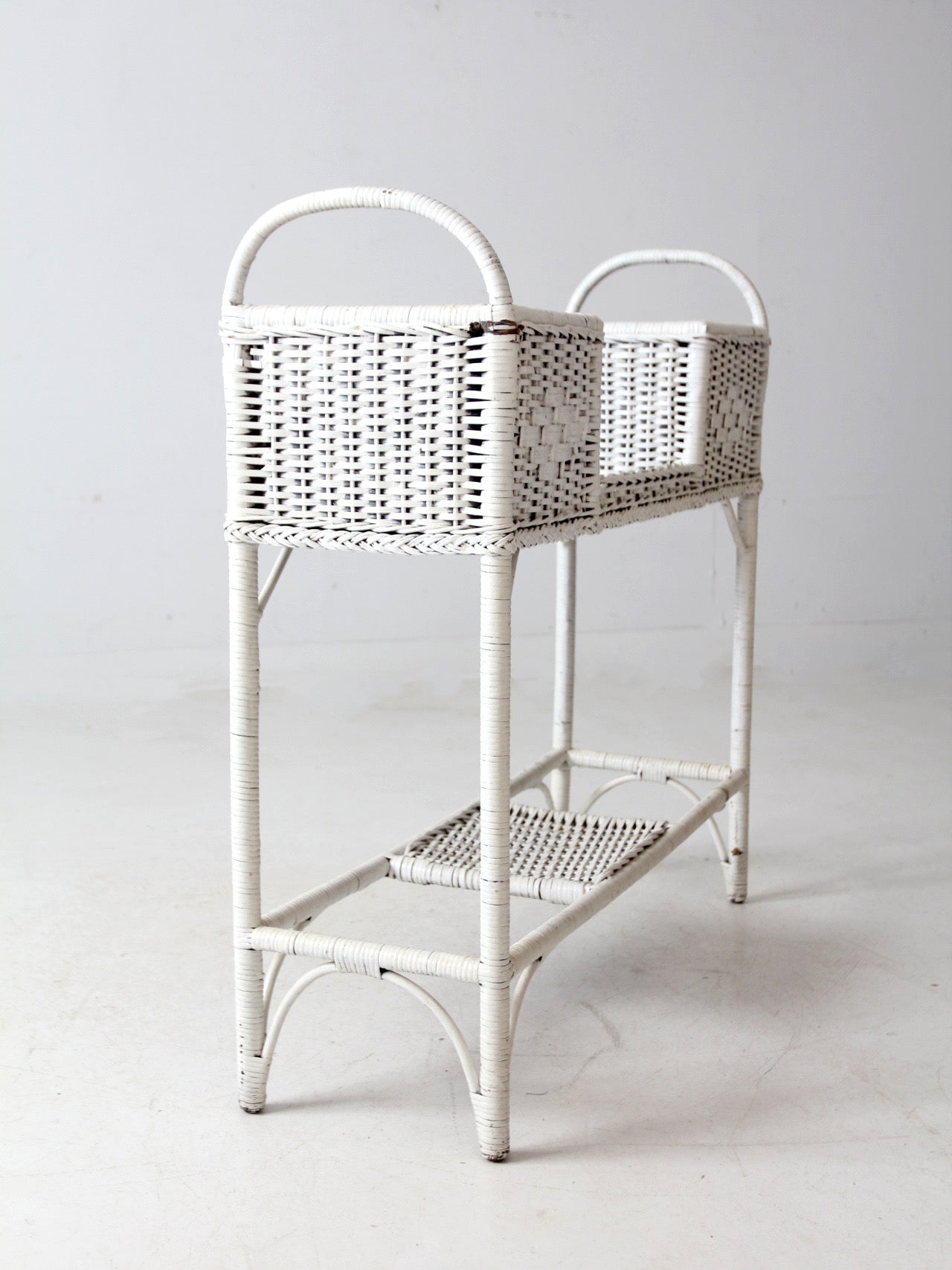 antique white wicker planter basket stand
