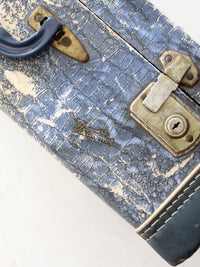 mid-century Vacationer blue suitcase
