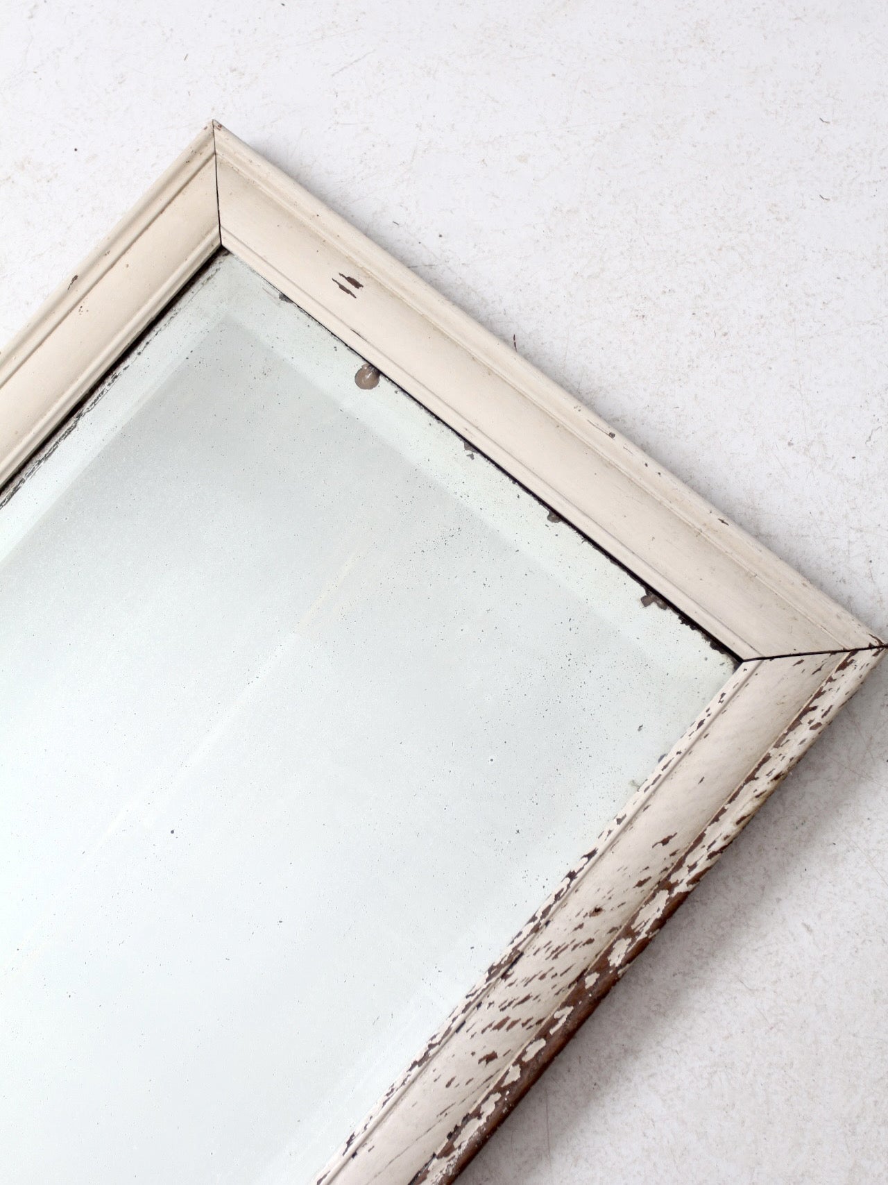 antique beveled glass mirror with painted wood frame