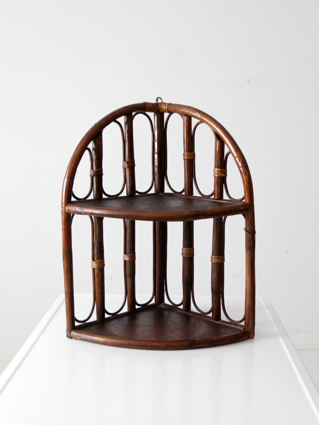 mid century rattan corner shelf