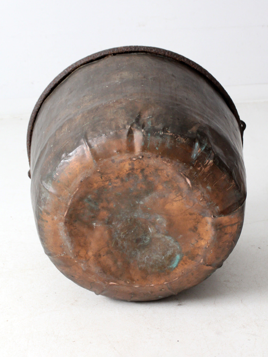 antique copper pot with iron handle