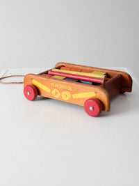 vintage 50s Playskool toy wagon with blocks