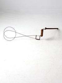 antique Cyclone Go-ZY rug beater by Wrightman Co.